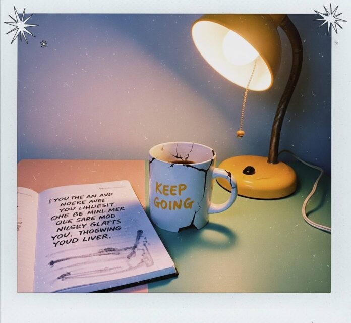 Cautious Optimism: Vintage "Keep Going" Desk Scene